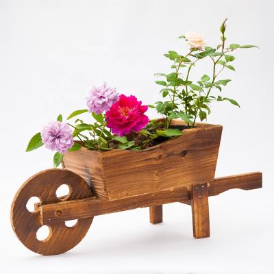 China Creative simple modern wooden flower cart garden flower cart shop front window wooden flower pot for sale