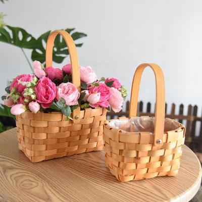 China Idyllic Europe Flower Arrangement Basket Decoration Straw Wicker Wood Bamboo Flower Basket Europe Portable Rattan Basket For Flower for sale