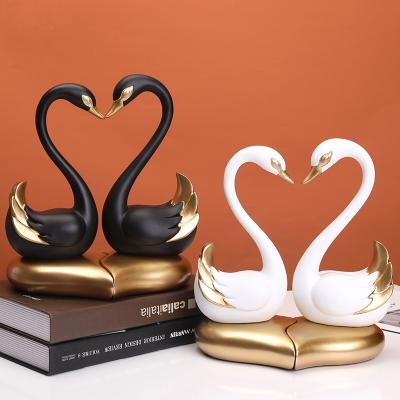 China Europe Style European Open Heart Creative Home Furnishing Ornaments Resin Swan Europe Couples Wedding Gifts Modern Wholesale Decoration for sale