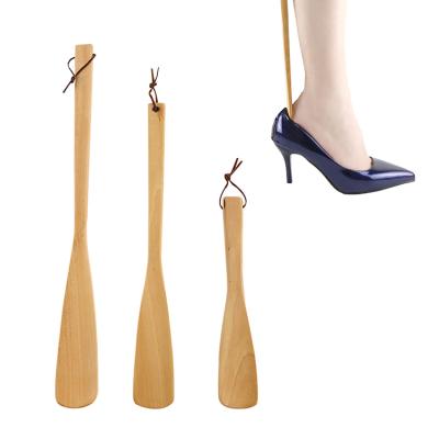 China Long Handle Household Elevator Shoe Wooden Horn Shoe Horn Durable Wooden Shoe Aid For Pregnancy Children Women Men for sale