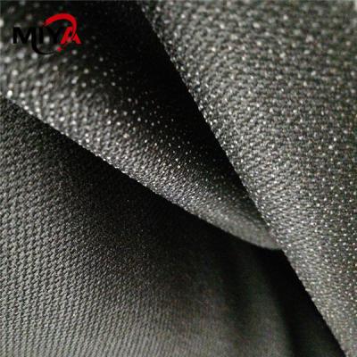 China PES Double Dot Shrink Resistant Woven Fusible Interlining Fabric White Black for sale