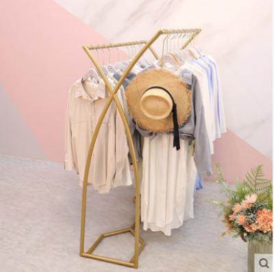 China New fashion clothing store display rack modern cheap decorative coat hanger economic decorative mental rack for sale