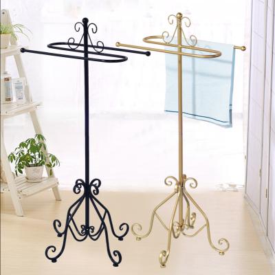 China Modern hot nordic style bedroom furniture home sale creative minimalist metal decoration floor clothes rack for sale