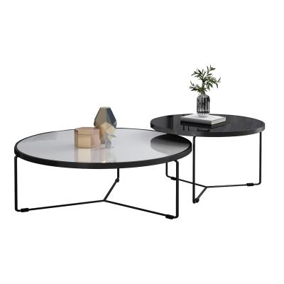 China Modern high temperature resistant electrostatic paint tempered glass accent round coffee table is suitable for living room dining office home decoration coffee table for sale