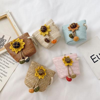 China Autumn Winter Eco-Friendly Kids Bow Mini Baby Purse One-shoulder Fashion Sunflower Princess Girl Trend Baby Little Straw Kids Pin for sale