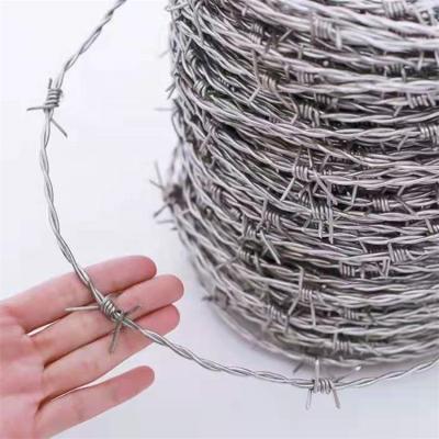 China Lawn low price 25kg 50kg per roll price gi electric hot dipped galvanized barb wire for sale