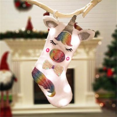 China Wholesale Creative Stuffed Plush LED Unicorn Christmas Stocking Kids Sequins Christmas Candy Bag Christmas Tree Decoration Stocking for sale