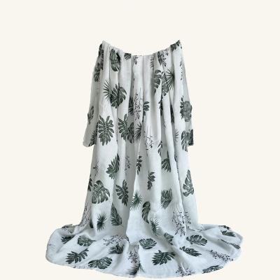 China Air Permeable Top Quality 100%bamboo Fiber Dye Print Leaves Design Comfortable Muslin Wrap For Infant for sale