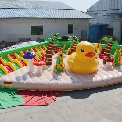 China PVC 10x10m Big Yellow Beach Duck Inflatable Theme Park With Inflatable Sofa For Rest And Entertainment for sale