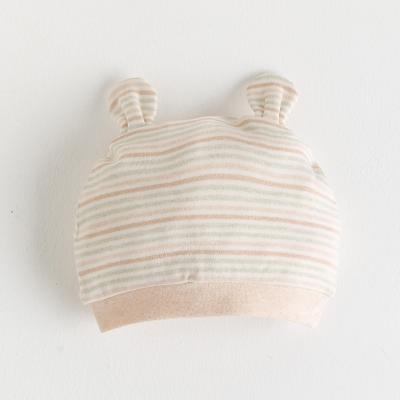 China Eco-Friendly Cozy Newborn Infant Baby Kids Knot Top Nature Colored Cotton Beanie Hats for sale