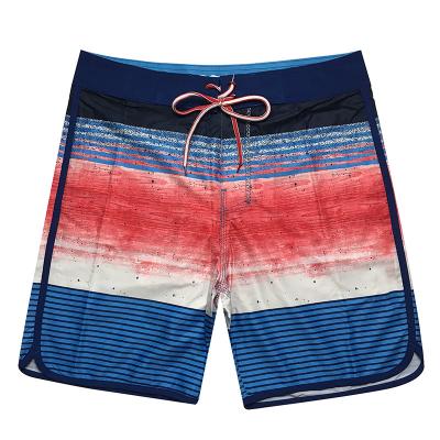 China Custom Sublimation Printed Anti-wrinkle Design,Your Own Fashion Couples Swimwear Beach Wear Shorts For Men And Women for sale