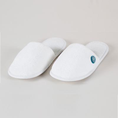 China Exquisite Disposable Hotel Amenities Customized Free Sample Cheap White Hotel Slipper Simple White Slippers for sale