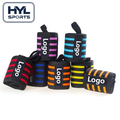 China Gym Fitness Wrist Wrap HYL-2633 Custom Logo Adjustable Fitness Compression Weightlifting Straps Gym Wrist Support Wraps for sale