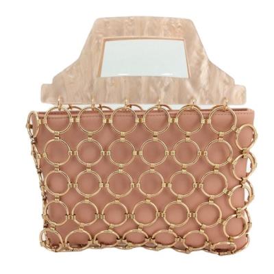 China Fashionable Acrylic and PU Material Blush Metal Ring Wrapped Clutch for sale