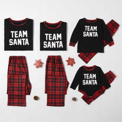 China Boutique Breathable Christmas Pajamas Set Black T-shirt And Plaid Pants Christmas Pajamas For Family for sale