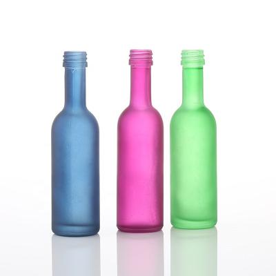 China Frosted Clear Decorative Blown Fancy Little Glass Beverage Liquor 50mL Fancy Wine Bottles For Spirits for sale