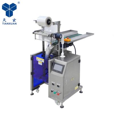 China Vertical food semi-automatic rivet nut metal pill button small grain package machine with good price for sale