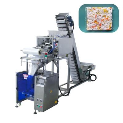 China Food Multihead Weigher and Vertical Forming/Filling/Sealing Packing Machine for Large Quantitative Products for sale