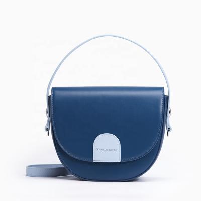 China Supplier Wholesale Custom Trendy Vegan PU Candy Color Leather Ladies Handbags Wave Cross - Body Hanbdag Wholesale Saddle Bag for sale