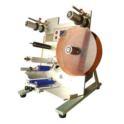 China SL-130 Verital Round Bottle Labeler Adhesive Sticker Labeling Machine For Round Bottles for sale