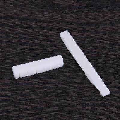 China GUITAR COW BONE Acoustic Guitar Hardware Nut and Saddle for sale