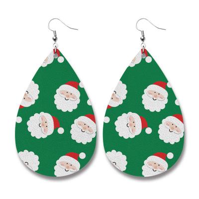 China TRENDY Christmas Charming Fashion Design Accessories PU Leather Santa Earrings Printed For Women Piercing Jewelry for sale