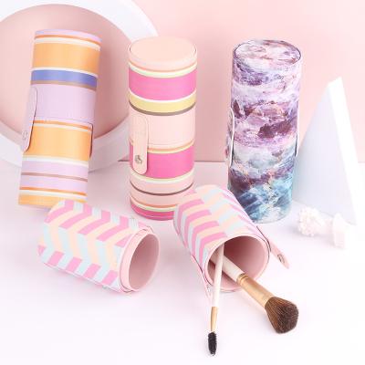 China New PU Fashion Stripes Makeup Brush Dynamic Cylinder Leather Case Material Cosmetic Holder Use For Makeup Brushes for sale