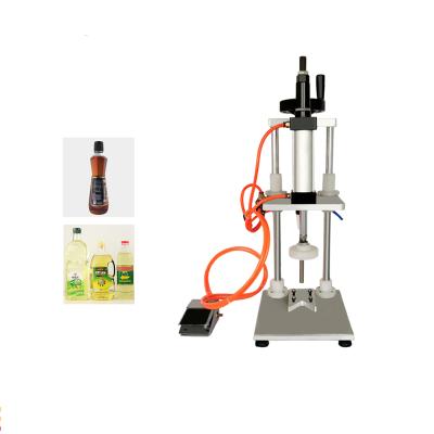 China Pneumatic Semi-automatic Wine Gin Jar Whiskey Plastic Beverage Liquor Bottle Covering Cork Pressing Capping Machine for sale