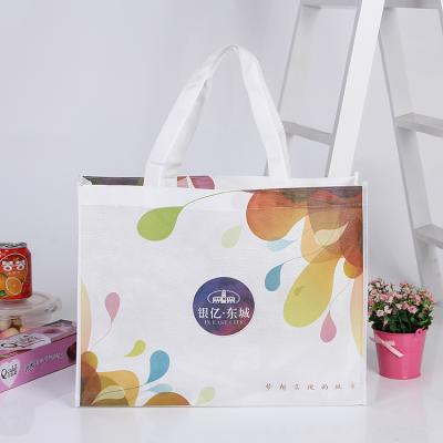 China Promotional high quality cheap eco friendly handled with custom logo printing shopping non woven bag for sale