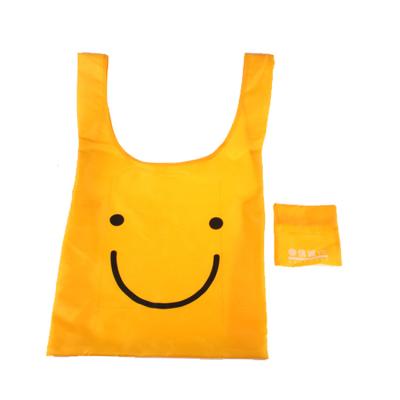 China OEM standard size polyester smile face promotional bag waterproof nylon custom bag easy to fold for sale