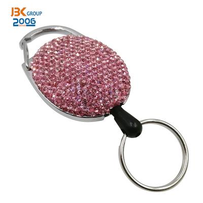 China Luxury Crystal Diamonds Reel Badge Buckle Micro Paved Rhinestone Key Chain ID Card Holder Retractable Jewelry for sale