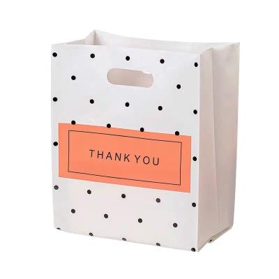 China 2021 New design customized recycled materials logo party paper gift bag white paper luxury THANK YOU bags for sale