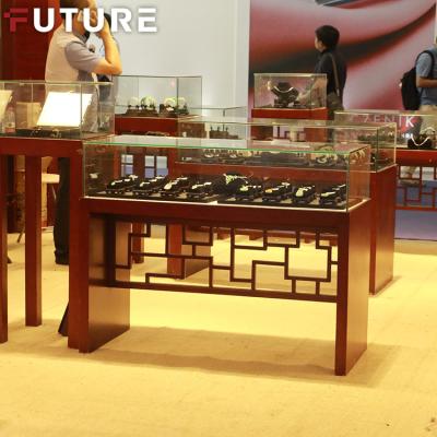 China Shopping Mall Optical Luxury Floral Free Standing Pedestal Gold Design Shop Display Glass Display Cabinets For Watch Kiosk for sale