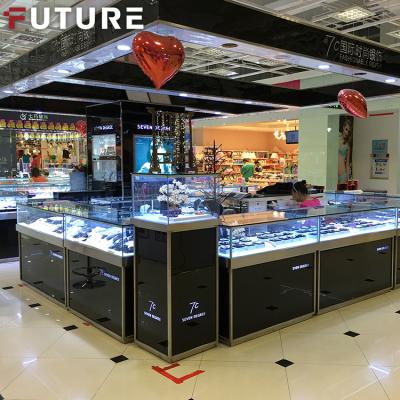 China Shop Factory Manufacturer Stainless Steel Display Rack Jewelry Ornaments Display High End Optical Electroplating Showcase for sale