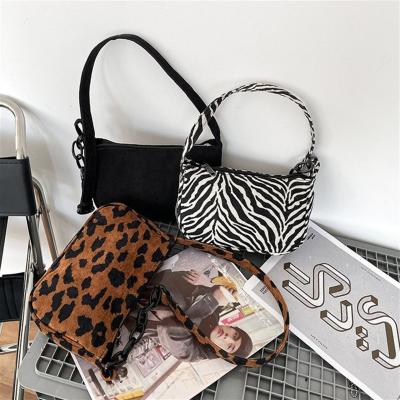 China Hot Selling Anti-theft Stylish Durable Canvas Retractable Zebra Simple Stripes Free Shoulder Bag For Girls for sale