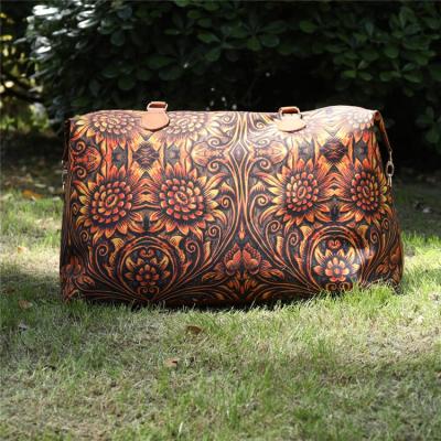 China Vintage Newcomer Engraving Overnight Weekend Bags Vintage Boho Large Capacity Tooled Sunflower Print Leather Travel Duffel Bag for sale