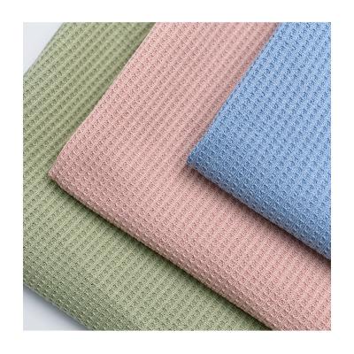 China Anti-Pilling Colorful Polyester Waffle Fabric Solid Plain Knitted For T-Shirt zu verkaufen