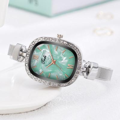 China Lady Watch Elegant Simple Ladies Quartz Steel Classic Watches Mesh Strap Watch Dress Little Power Reservation for sale