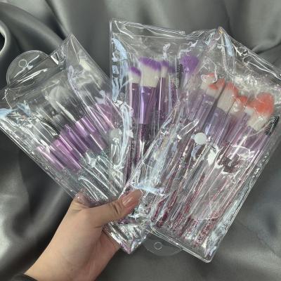 China Angular Blush Custom Logo Diamond Purple Crystal Soft Fluffy Makeup Brush Set With Bag Wholesale Vendors for sale