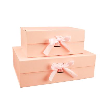 China Custom Hot-selling Logo Paper Pink Magnet Foldable Recyclable Folding Magnetic Gift Box for sale