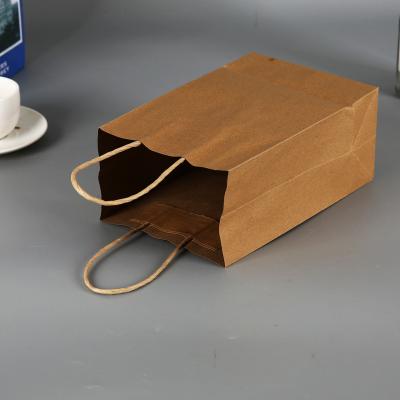 China Recycled Materials Customized Paper Bags Pharmacy Paper Bag Customized Paper Bag With Handle for sale