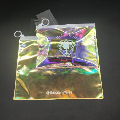 China BIODEGRADABLE Custom Plastic Cosmetic Transparent Zipper Pouch Holographic PVC Laser Makeup Bag for sale