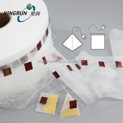 China Biodegradable Hotels PLA Corn Fiber Tea Bag Roll Nonwovens Bag Filter For Tea Packaging Film Roll for sale