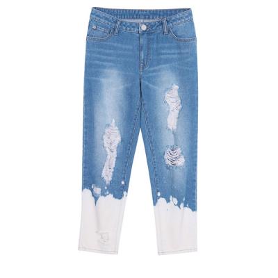 China Breathable Cotton Denim Ripped Jeans Women Tie Dye Bleach Trendy Pencil Distressed Jeans For Ladies for sale