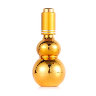 China 10ml-100ml Pretty Appearance Glass Golden Perfume Bottle , Pumpkin Essential Oil Bottle for sale