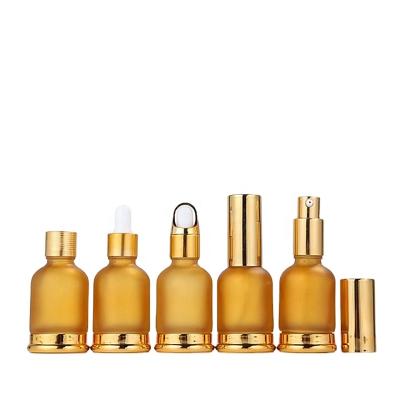 China Luxury Custom Logo Personal Care Gold Essential Oil Glass Bottle 10ml Dropper Bottle Essential Oil Glass Bottle With Glass Dropper for sale