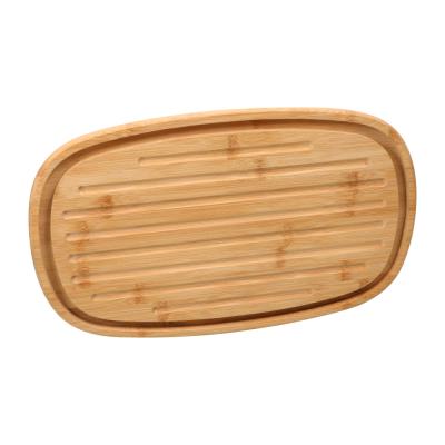 China New Sustainable Bread Cutting Board Bamboo Bread Board With Groove Chopper for sale