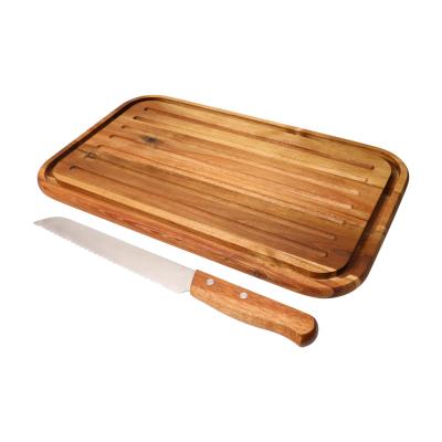 China Sustainable Acacia Wood Bread Cutting Board With Bread Knife For Home Single Bread Serving Tray for sale