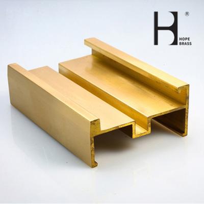 China Shining Copper Extruded Profiles Brass Extruding Window Head Sections for sale