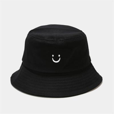 China Custom Foldable Bucket Sun Hat Outdoor Rising Logo Cotton Smiley Embroid Bucket Foldable Fishing Hat for sale